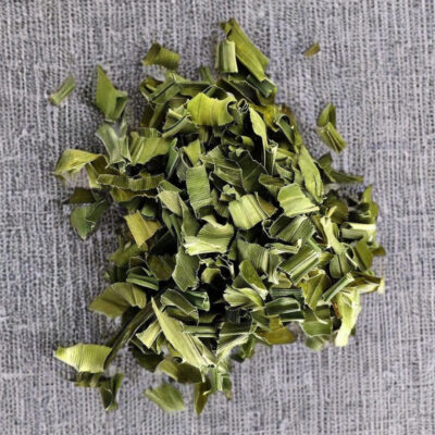 Dried pandan leaf pieces on a grey cloth