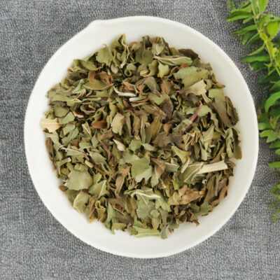Dried peppermint leaves in a white bowl
