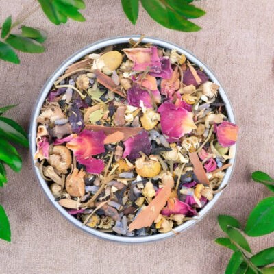 Serenity Sip loose herbal tea with rose petals in a bowl