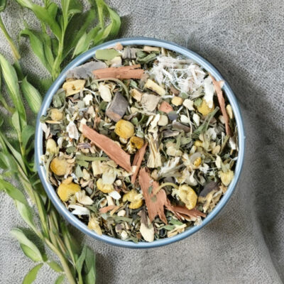 Bliss Blend loose herbal tea with flowers in a bowl